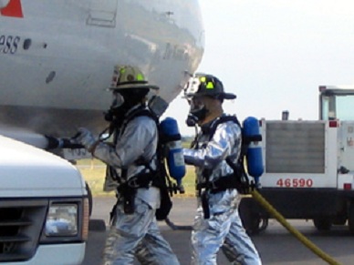  Lehigh Valley International Airport Trapnsportation Emergency Preparedness Program Exercise - responders extinguish belt loader fire at the exercise accident scene. 